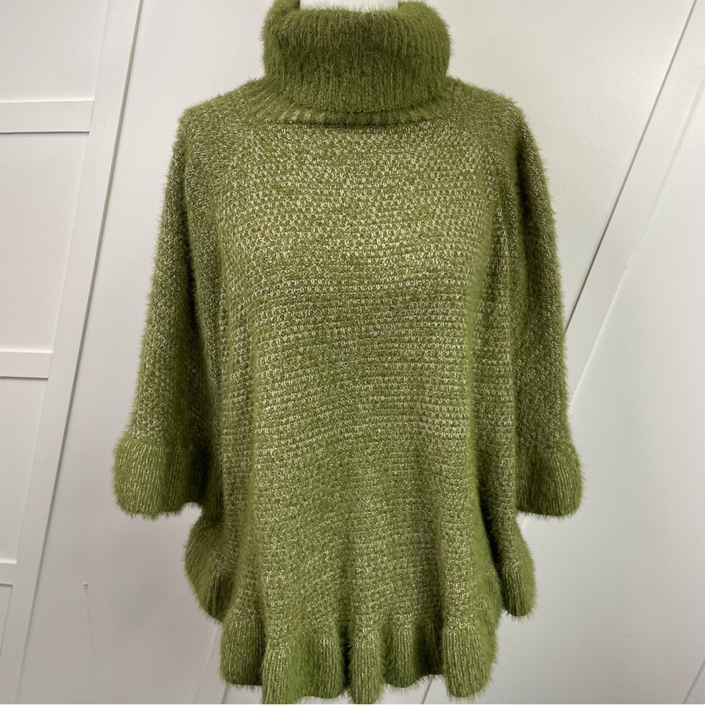 Anthropologie ruffle hem ponch/cape